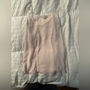 Beautiful light pink camisole top.  Classy. Fresh. Demure